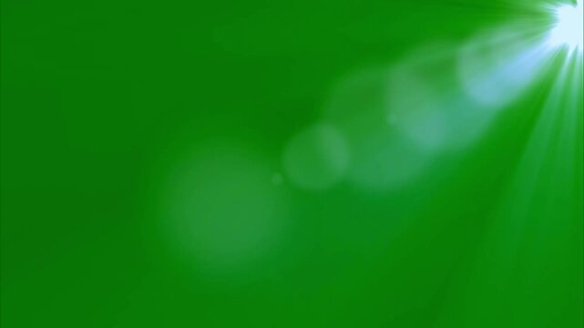 Top right side sun rays on green screen. 4K beautiful white spotlight effects moving on top right. Flash lights, bright light lens flare effect