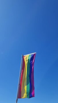 Pride rainbow flag waving in the wind
