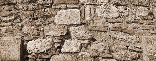 Obraz premium Weathered Stone Wall Texture Background