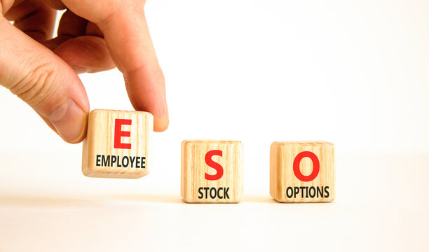 ESO employee stock options symbol. Concept words ESO employee stock options on beautiful wooden blocks. Beautiful white background. Business ESO employee stock options concept. Copy space.