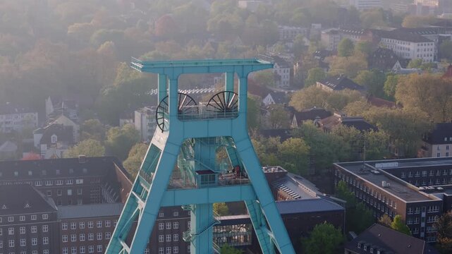 Aerial view of the headframe at the german mining museum in bochum during a hazy morning