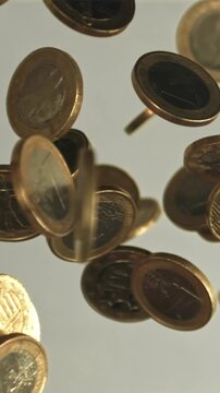 Coins fly up and fall down. Filmed is slow motion 1000 fps. High quality FullHD footage