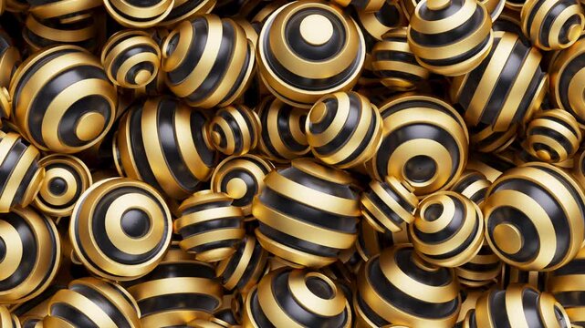 Satisfying abstract sphere animation you can&rsquo;t stop watching. A pile of glossy, black and gold striped spheres fills the frame, creating a rich, textured pattern.