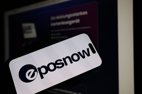 Kiel, Germany - 05-20-2026: Smartphone displaying British point of sale software company Epos Now logo in front of companys webpage