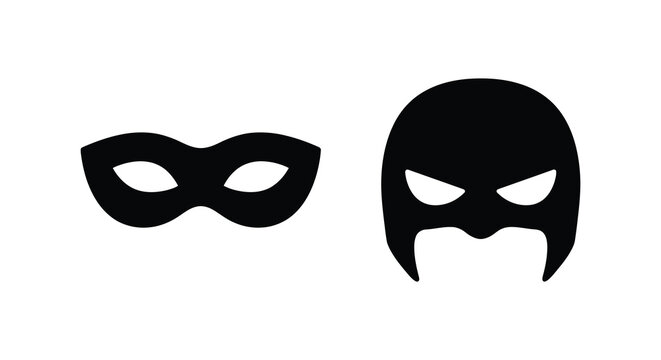 Two black superhero masks isolated on a white background dramatic character disguise silhouette