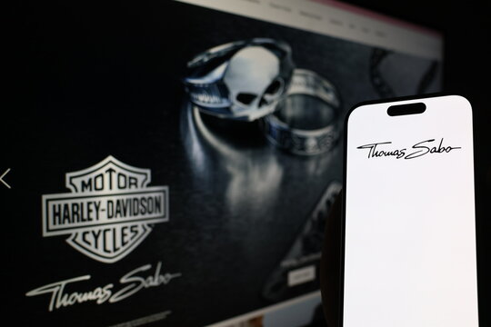 Kiel, Germany - 05-20-2026: Smartphone displaying German jewelry company Thomas Sabo logo in front of companys webpage