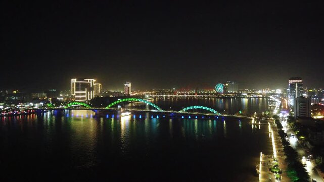 Dragon Bridge Da Nang Vietnam at night with colorful lights