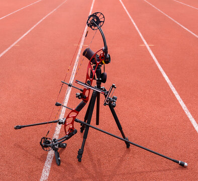 Archery. Spyglass telescopic. Professional compound bows. Competition field. Track lines. Archery arena. The composite bows is placed on a stands. Equipment for archery. Sports concept