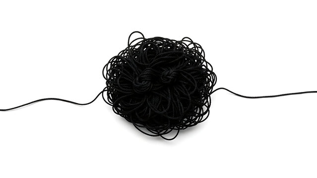Black fuzzy yarn ball with string ends