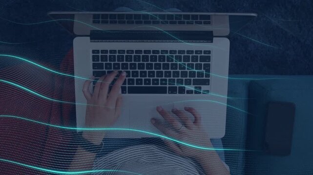 Woman moving hands from rest and typing on laptop for remote work, teal data waves sweeping