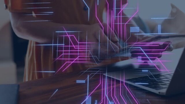 Woman typing laptop causing neon code overlays grabbing tablet switching devices while testing tech