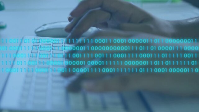 Woman typing at keyboard, using mouse, activating binary overlay visualizing tech data flow
