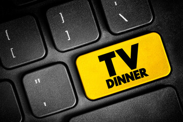 Naklejka premium TV Dinner - is a packaged frozen meal that comes portioned for an individual, text button on keyboard, concept background