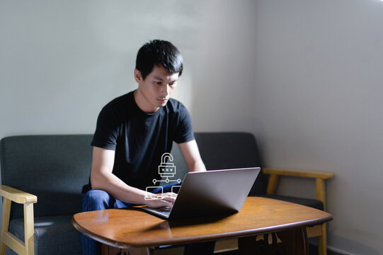 Professional Man Working on Laptop with Network Security Concept