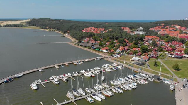 Aerial drone view of the picturesque resort town of Nida, located on the Curonian Spit, a UNESCO World Heritage Site in Lithuania.