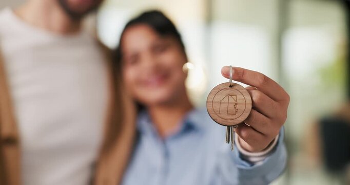 Hands, couple and keys for moving to new home for property purchase, security and marriage goals. Real estate, people and keychain in dream house for investment pride, relocation support or insurance