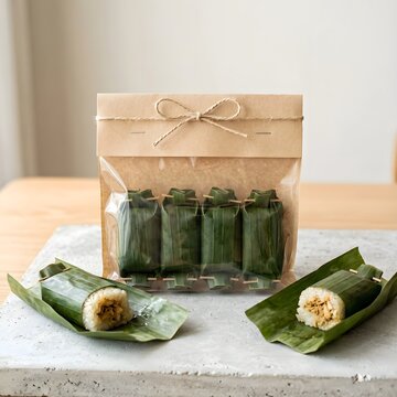 Indonesian Lemper Rice Cake Wrapped in Banana Leaf with Modern Kraft Packaging