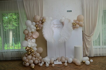 Children's photo zone with wings for a child's baptism © Александр Франко