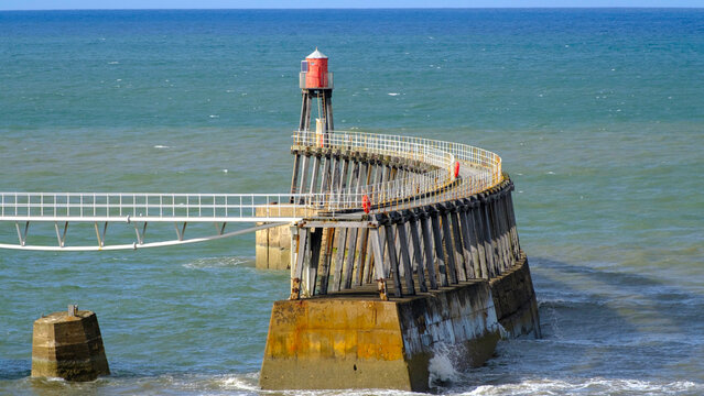 Harbour wall in blue ocean
