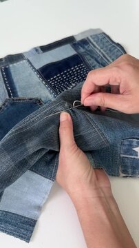 Handmade Denim Patchwork Fabric with Sashiko Stitching on Sewing Workspace
