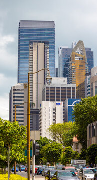 Singapore - 26 December, 2025: Cityscape from Cecil Street with Central Business District, Singapore. Modern skyscrapers Frasers Tower and OUE Downtown