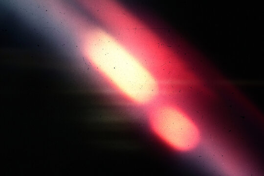 light leak overlay effect with pink light ,retro grain noisy film flare on black background,analog old film burn overlay,Light Leak Film Poster Photo Effect Mockup.abstract lights background