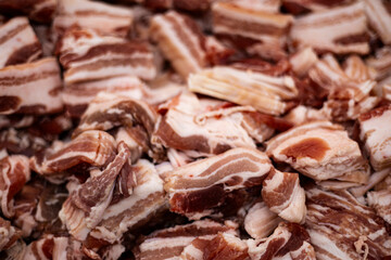 Fresh Sliced Pork Belly On Display At A Local Market