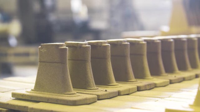 Row of Industrial Sand Molds on Factory Production Line