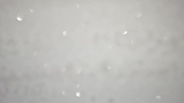 Close-up abstract macro footage featuring a dark frosted surface with subtle sparkling highlights and soft cinematic focus. Ideal for background overlays, moody edits, sci-fi visuals, title sequences,
