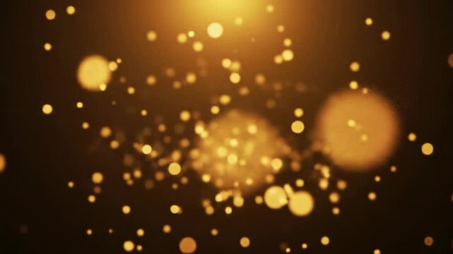 A wide video of tiny, radiant golden particles shimmering and drifting upwards in an infinite velvety black void, illuminated by warm golden light with soft focus and creamy bokeh. Ethereal dreamlike