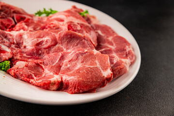 Obraz premium Raw pork steak pork tenderloin, food preparation lunch or dinner tasty organic snack fresh farm product delicious gourmet food background on the table rustic food, top view copy space