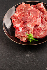 Fototapeta premium Raw pork steak pork tenderloin, food preparation lunch or dinner tasty organic snack fresh farm product delicious gourmet food background on the table rustic food, top view copy space