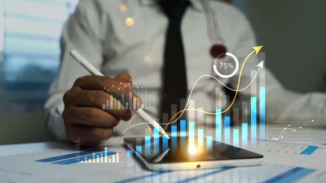 Businessman using a tab with hologram business graph bar animation on the screen, Businessman using tablet analyzing future holographic data chart growth statistics