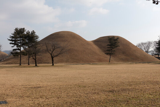 South Korea's Daereungwon Tomb Complex, Gyeongju on a cloudy winter day.