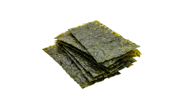 A pile heap of dry organic dark green seaweed nori sheets cooking culinary ingredient isolated on transparent background cut out