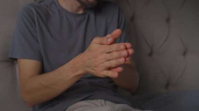 Man rubbing palms together, high quality uncompressed audio recording. Soft friction hand sound and expressive gesture. Anticipation, preparation and everyday human behavior concept.