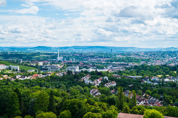 Obraz premium Germany, Aerial urban landscape of Stuttgart Killesberg with industrial power plant in distance