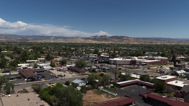 Wide aerial small town Vernal Utah in high desert in Uinta Mountains