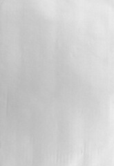 Fototapeta premium Minimal white paper texture background with subtle grain and soft natural shadows. Clean abstract surface ideal for design templates, mockups, branding, stationery, artwork presentations.