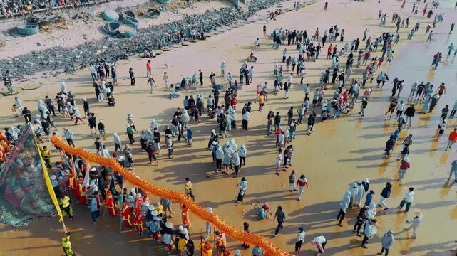 Aerial view of Nghinh Ong Whale Festival parade on Phuoc Hai beach, Vietnam