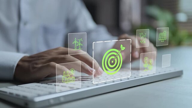 Sustainable digital business management concept. Person typing keyboard with renewable energy and environmental analytics icons, corporate sustainability, carbon reduction and responsible business ope