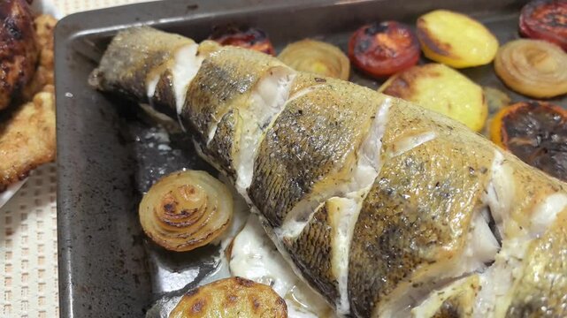 Enjoy the vibrant process of baking pike perch, beautifully paired with assorted vegetables. Watch as this delicious dish transforms in a cozy kitchen. Perfect for special occasions or family dinners.