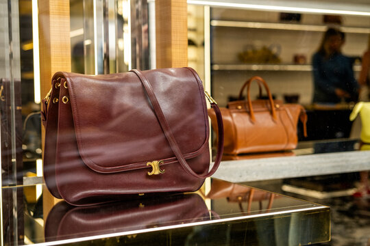 Celine Paris Luxury Handbags in Boutique Window Display Showing Designer Leather Purses and Accessories Milan Italy May 14, 2026