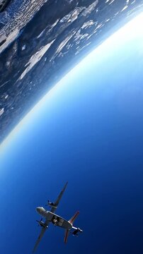 View from an airplane - a parachutist in free fall over a snowy area, extreme sports, aviation, altitude, winter landscape.

