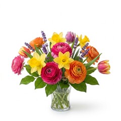 Fototapeta premium A beautiful arrangement of pink and orange ranunculus yellow daffodils purple lavender and tulips in a clear glass vase against a white background.