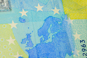 Fototapeta premium Close-up of a Euro banknote showing a map of Europe and stars