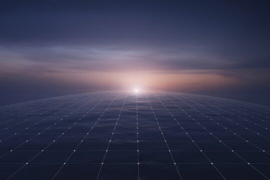 Glowing sunset over ocean with sun rays piercing through dark clouds