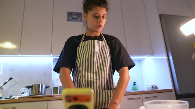 Wide shot captures chef explaining crust preparation method