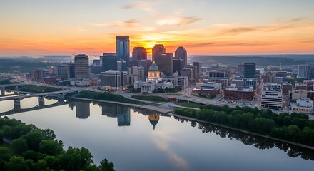 Fototapeta premium Modern City Skyline Reflected in Calm River at Colorful Sunset