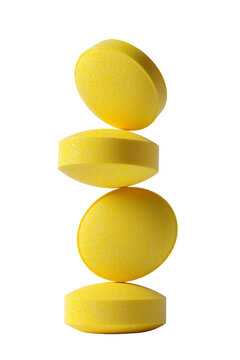 Yellow Round Tablets Stacked in Delicate Vertical Balance Isolated on Transparent Background PNG